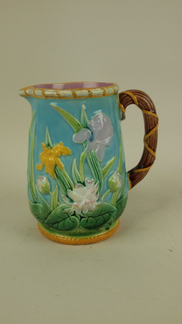 Majolica George Jones turquoise water lily and iris: Majolica George Jones turquoise water lily and iris pitcher, professional hairline repair, 5 3/4"