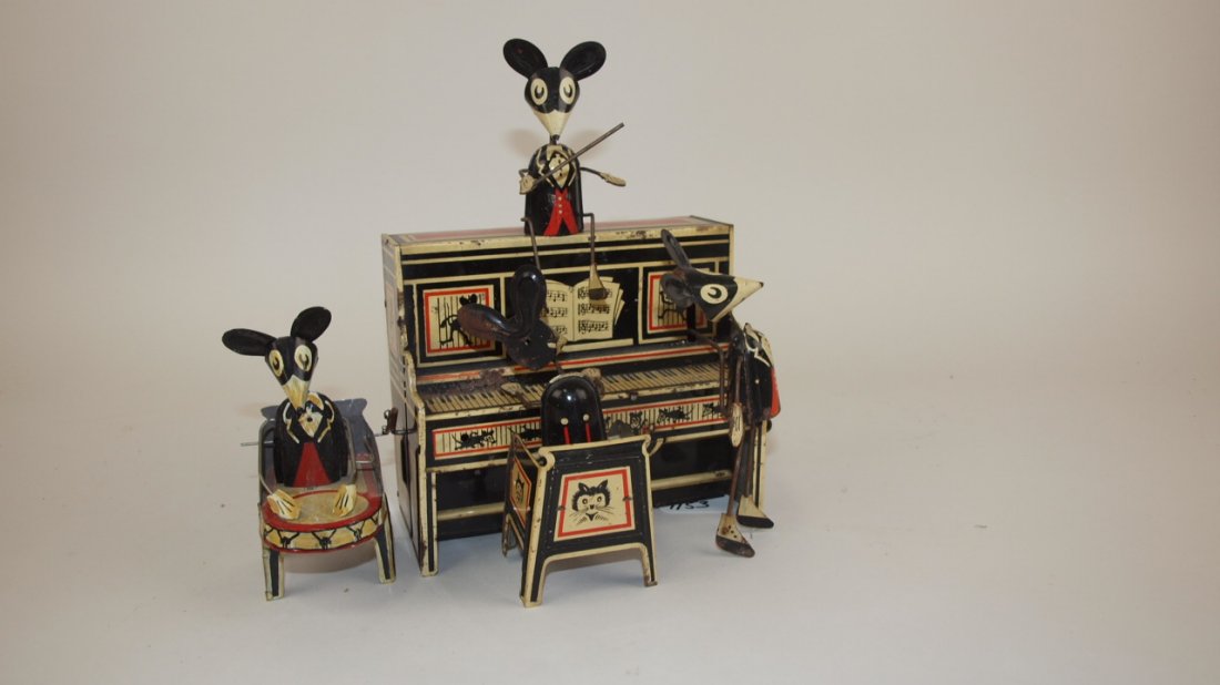 Marx "Merry Makers" tin lithograph wind up toy, some: Marx "Merry Makers" tin lithograph wind up toy, some parts replaced