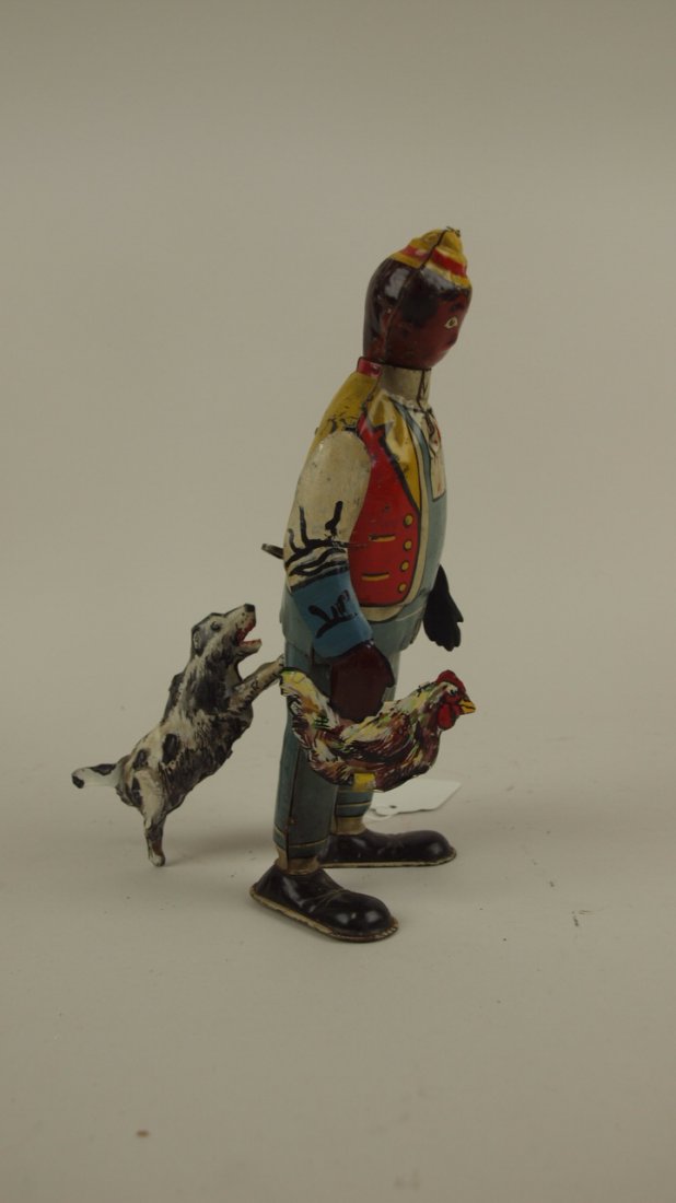 Marx "Hey Hey the Chicken Catcher" tin lithograph wind: Marx "Hey Hey the Chicken Catcher" tin lithograph wind up toy, some parts replaced