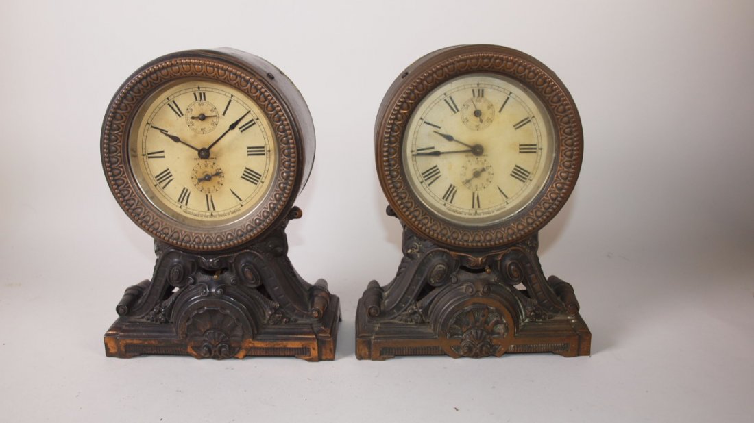 Seth Thomas pair of cast metal shelf clocks 9": Seth Thomas pair of cast metal shelf clocks 9"