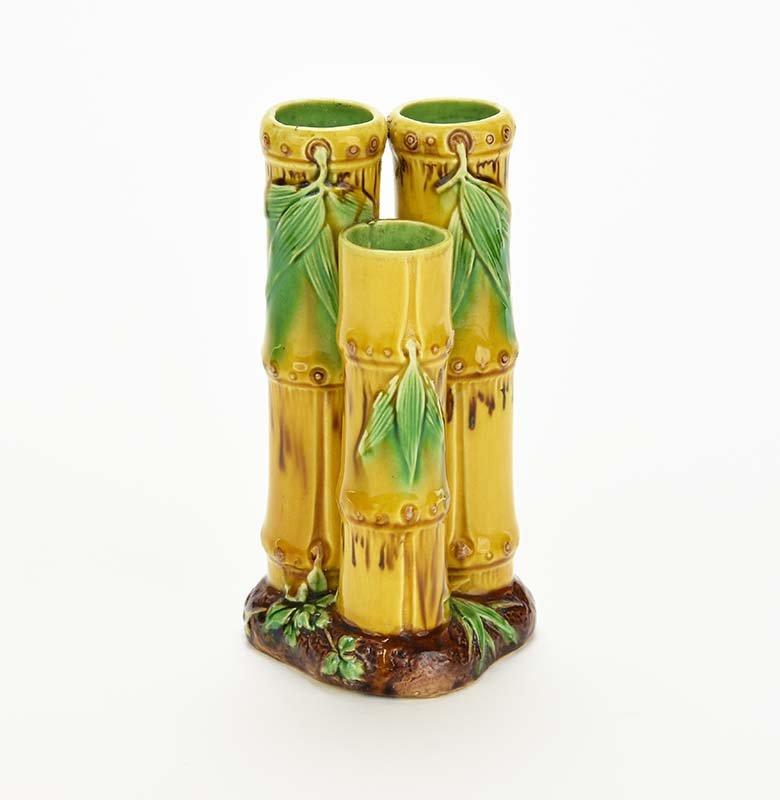 A Very Rare Minton Majolica Posy Vase c.1875 Modelled: A Very Rare Minton Majolica Posy Vase c.1875 Modelled as three upright yellow bamboo canes all supported on an earthy ground, 6 1/4" Catalogued and curated by Nicolaus Boston