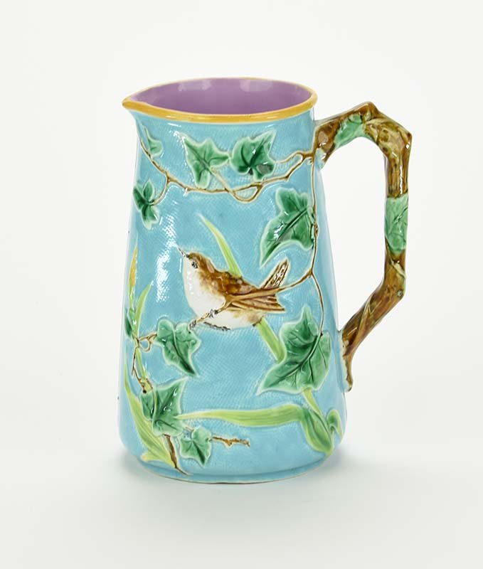 A Rare George Jones "Robin and Ivy" Pitcher, c. 1875,: A Rare George Jones "Robin and Ivy" Pitcher, c. 1875, the turquoise ground straight sided body decorated with ivy leaves, grasses and robins with branch handle and pink interior, 7" Catalogued and cur