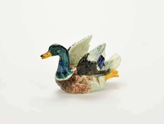 Delphin Massier Majolica ‘Drake’ Posy Vase c. 1880.: Delphin Massier Majolica ‘Drake’ Posy Vase c. 1880. Shape no.932. Modelled as a brightly glazed Drake with an open back to form the flower holder, 9" Catalogued and curated by Nicolaus Boston