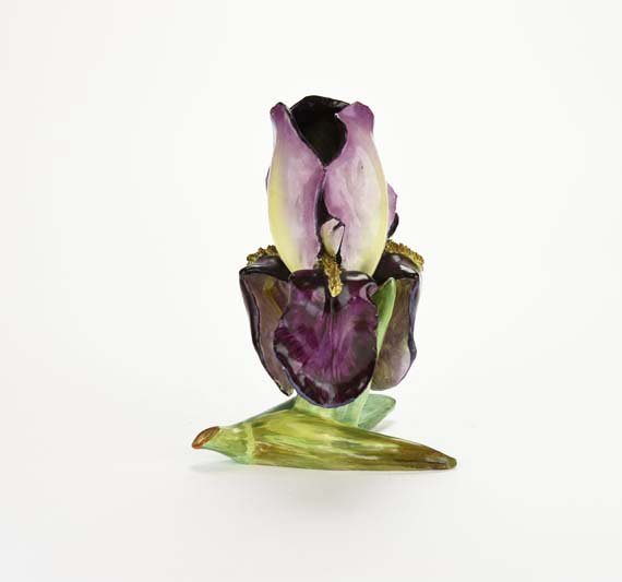 A Jerome Massier Majolica ‘Iris’ Vase c.1880 Shape No.: A Jerome Massier Majolica ‘Iris’ Vase c.1880 Shape No. 1160. Modelled as an iris with purple and cream coloured leaves and green stem forming the support, 12" Catalogued and curated by Nicolaus Bo