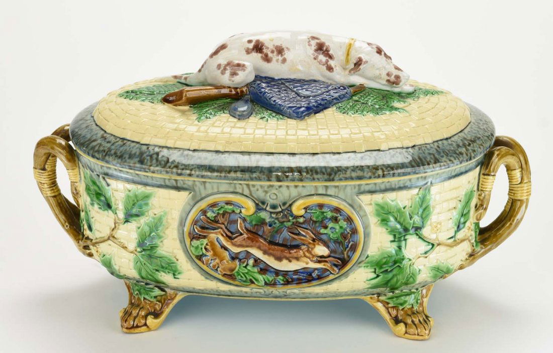 A Minton Majolica ‘Gun Dog’ Game Tureen c.1875 Shape: A Minton Majolica ‘Gun Dog’ Game Tureen c.1875 Shape no. 964. Modelled as an oval cream ground basket and cover with holly leaves to the sides, the holly branches forming handles at each end, with