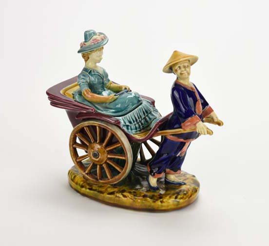 A Very Rare Sarreguemines Majolica ‘Rickshaw’ A Very: A Very Rare Sarreguemines Majolica ‘Rickshaw’ A Very Rare Sarreguemines Majolica ‘Rickshaw’ Tobacco Jar and Cover c.1875 (Never seen before). Modelled as a Chinaman pulling a rickshaw with a l