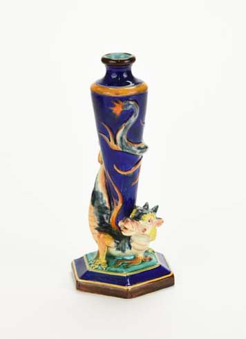 A Wedgwood Majolica ‘Dragon’ Posy Vase c.1875 Modelled: A Wedgwood Majolica ‘Dragon’ Posy Vase c.1875 Modelled by H. Protat. The thin cobalt blue body wrapped by a brightly glazed dragon and all upon a hexagonal pedestal base, 9 1/4" Catalogued and cur