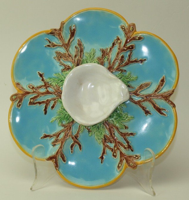 George Jones Majolica 6 well oyster plate with: George Jones Majolica 6 well oyster plate with turquoise wells and white raised center well, ref: Karsnitz pg. 44, 10", professional repair to center well