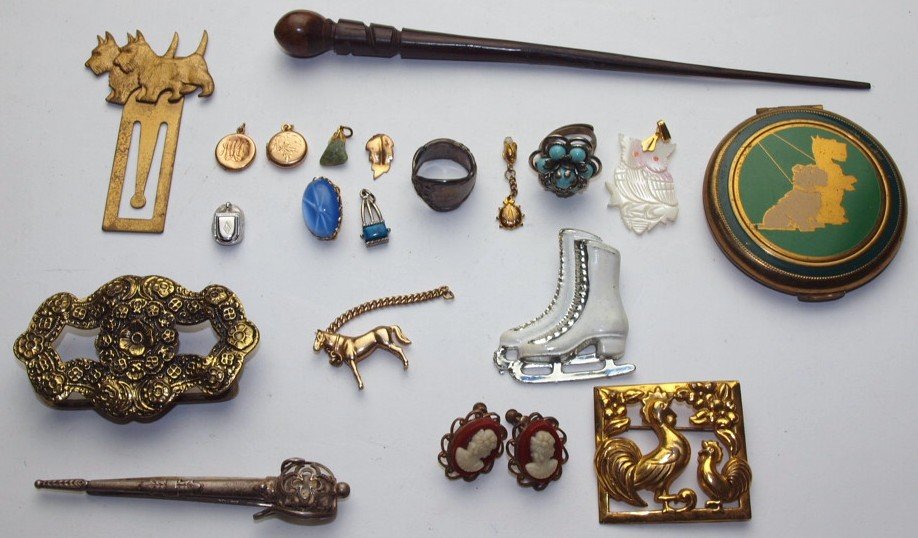 Lot of assorted pendants, pins, buckles, & jewelry some (1 of 1)