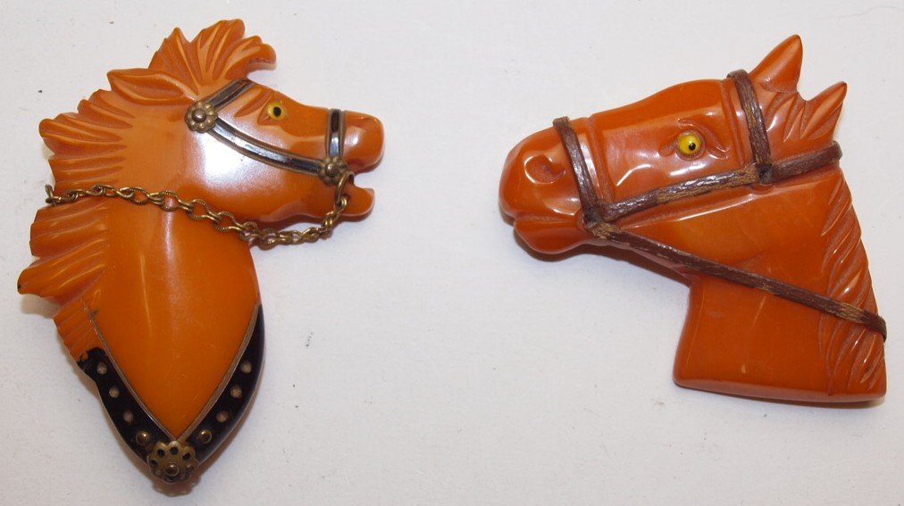 Bakelite lotof 2 horse brooch pins (1 of 1)