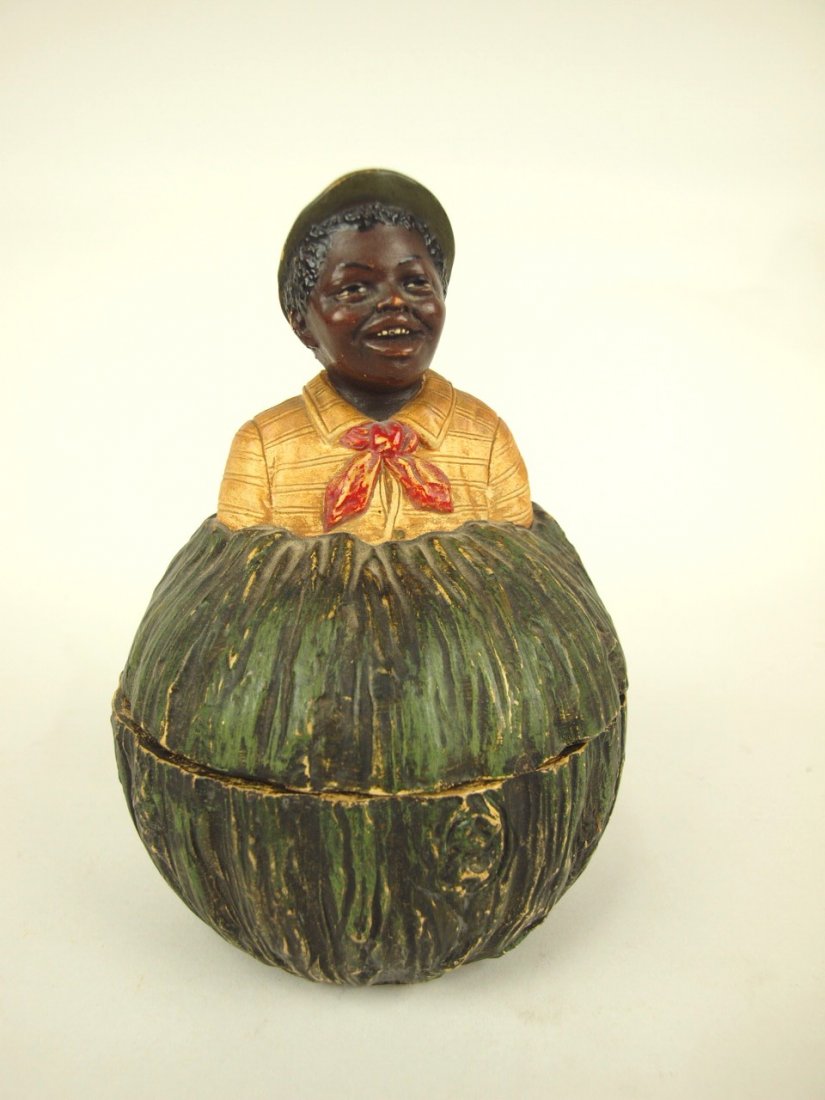 Terra Cotta Blackmoor man in melon figural humidor, 7",: Terra Cotta Blackmoor man in melon figural humidor, 7", signed JM