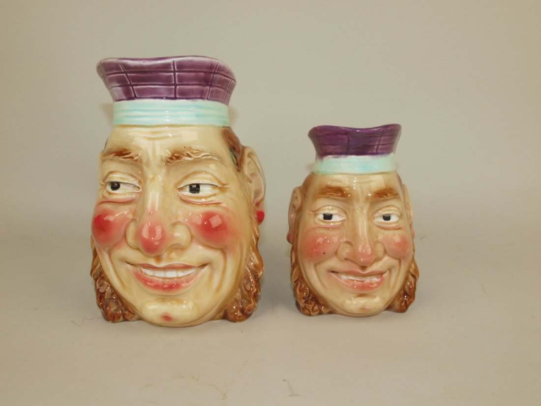 Majolica Sarreguemines style lot of 2 figural jugs: Majolica Sarreguemines style lot of 2 figural toby jugs, 7" and 5 1/2"