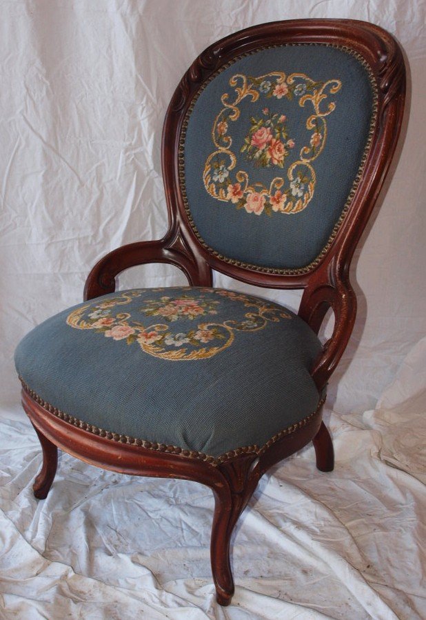 Walnut Victorian finger carved parlor chair with needle (1 of 1)