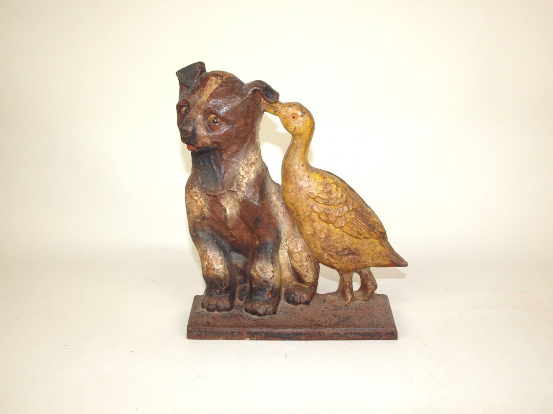 Cast iron dog with duck door stop, Greenblatt, 1925 (1 of 1)