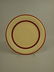 Fiesta 10" plate, ivory with maroon stripe, glaze