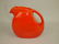 Fiesta disk juice pitcher, red, chip, hairline