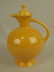 Fiesta water carafe, yellow, nick to finial