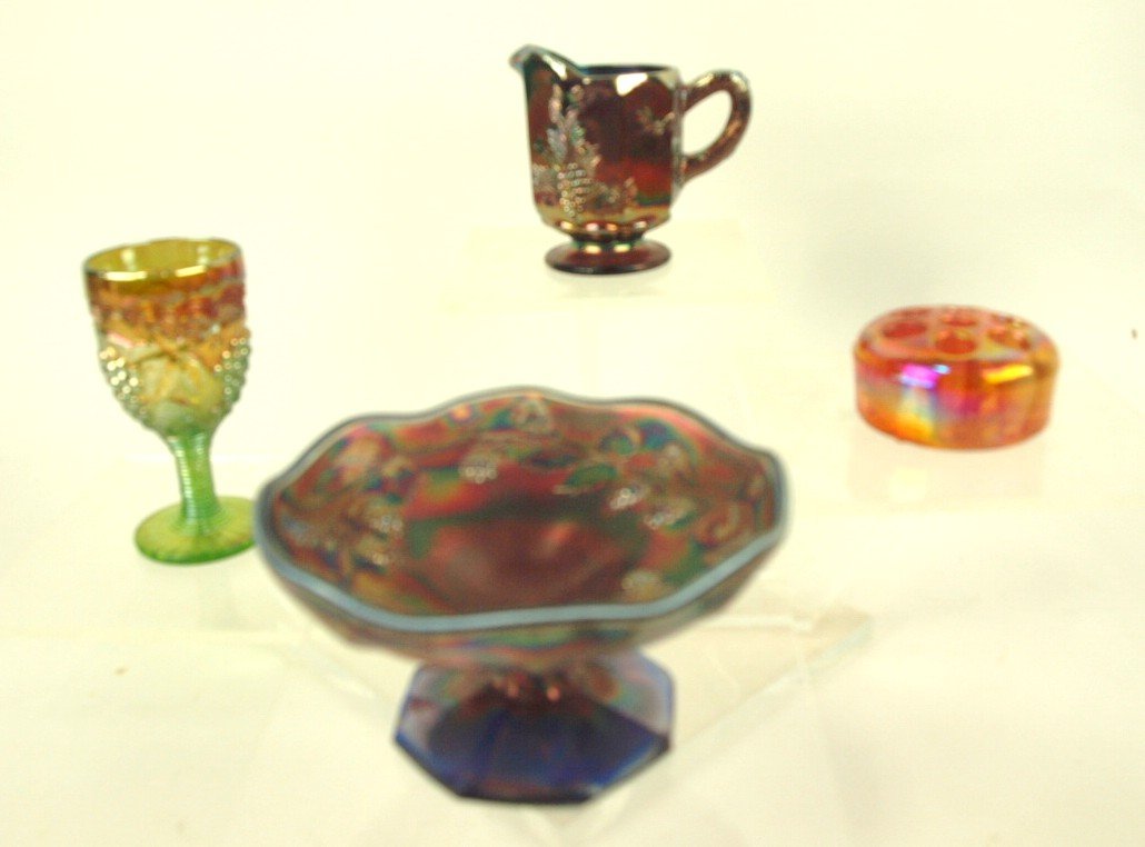 Carnival glass: creamer, wine glass, small compote and: Carnival glass: creamer, wine glass, small compote and flower frog