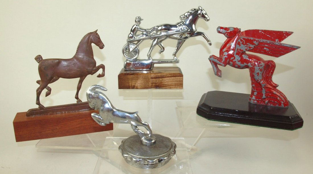 Lot of 4 hood ornaments: horse with sulky and rider, (1 of 1)