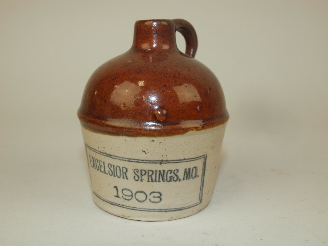 Stoneware miniature brown & white advertising jug (1 of 2)