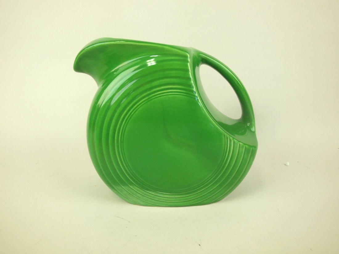 Fiesta disc water pitcher, medium green, uneven glaze (1 of 2)