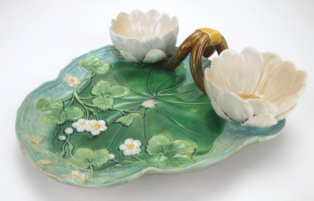 George Jones majolica turquoise strawberry server with: George Jones majolica turquoise strawberry server with water lily cup cream and sugar, rim repair, 10"