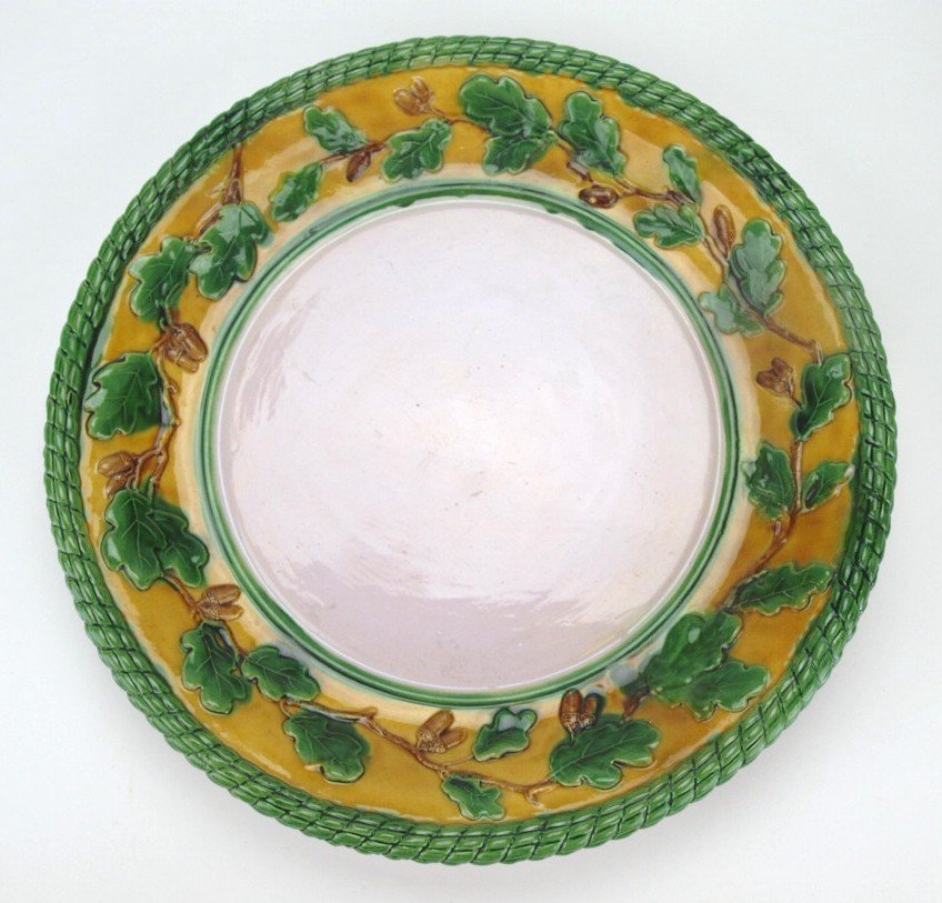 Minton majolica yellow and green oak leaf and acorn: Minton majolica yellow and green oak leaf and acorn jardiniere stand, 15"