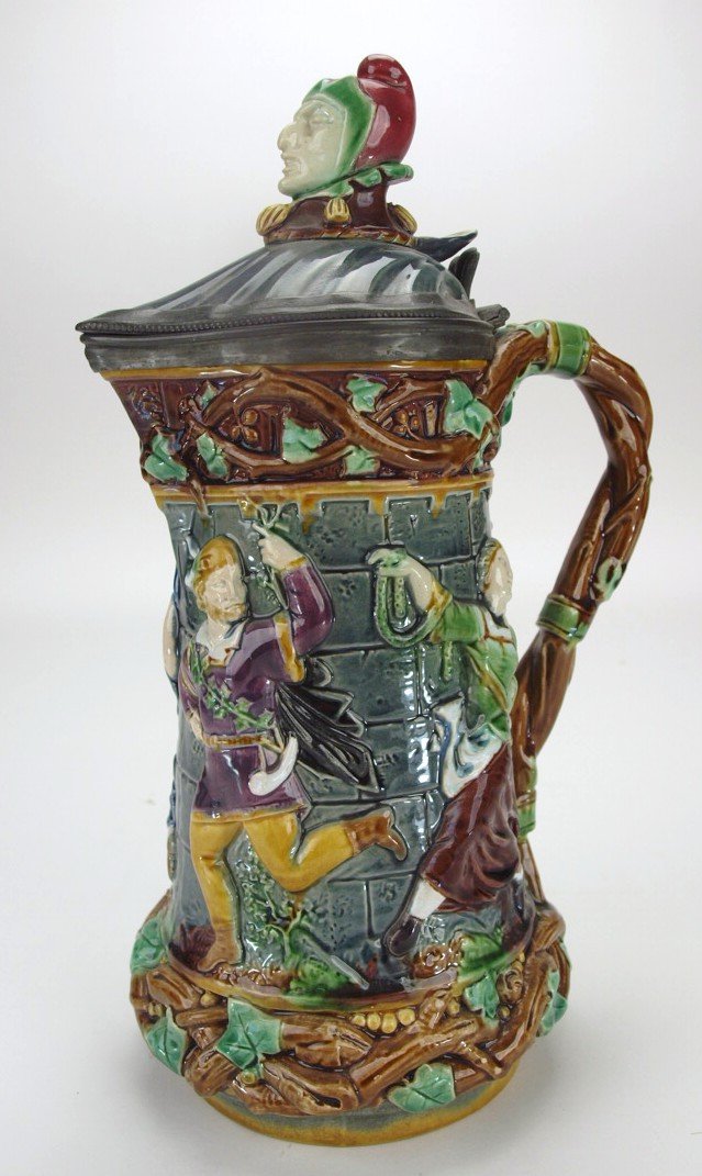 Minton majolica tower jug with jester finial, 13",: Minton majolica tower jug with jester finial, 13", professional repair to lid, former Karmason Collection