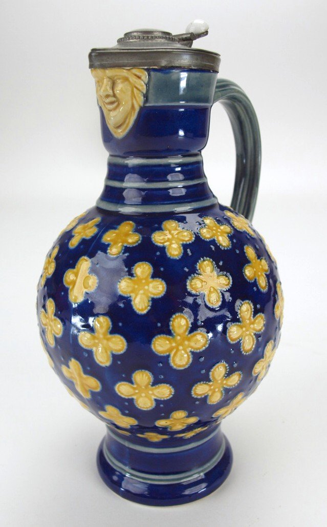Minton majolica cobalt Fleur De Lis jug with mask spout: Minton majolica cobalt Fleur De Lis jug with mask spout and pewter lid, 8 1/2"