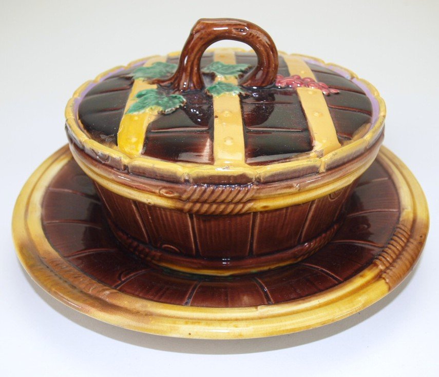 George Jones majolica butter tub and stand interior rim: George Jones majolica butter tub and stand interior rim wear to tub, 8"d