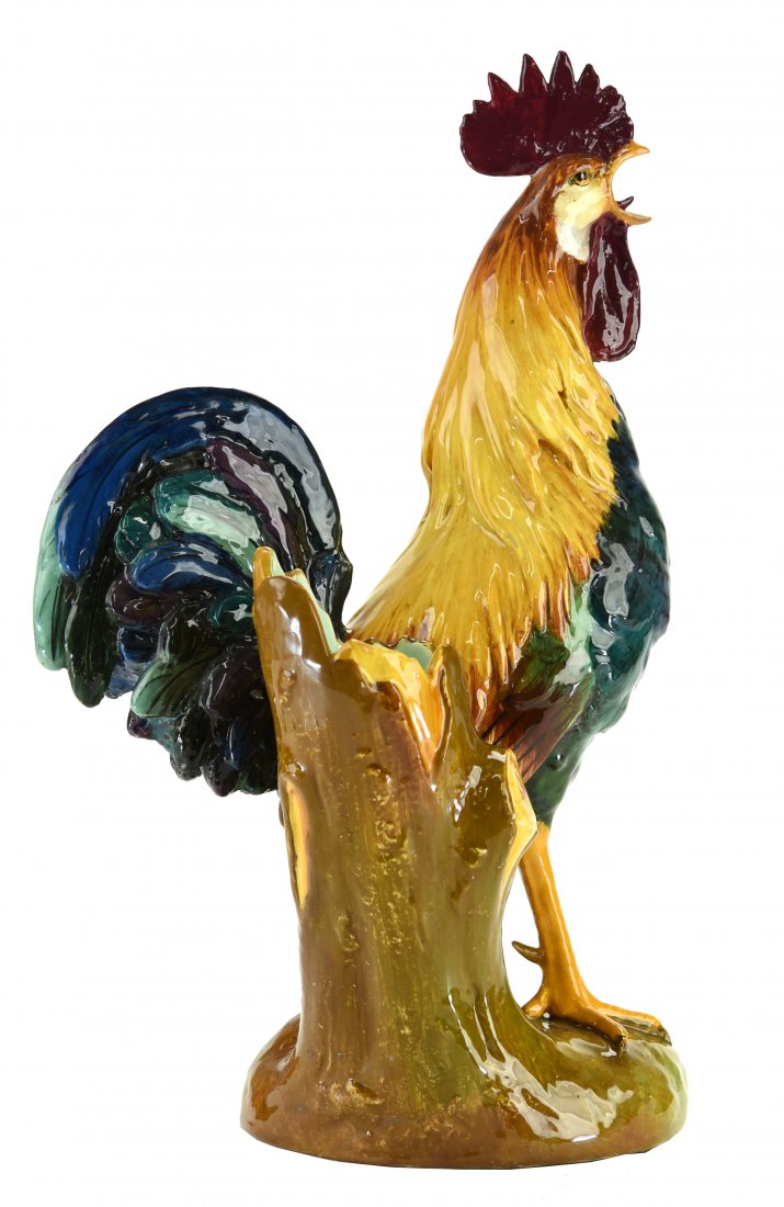 A Jerome Massier Majolica ‘Rooster’ Vase c.1880 Modeled: A Jerome Massier Majolica ‘Rooster’ Vase c.1880 Modeled as a brightly glazed rooster infant of a tree trunk flower vase, all on an earthy ground. Signed Jerome Massier to underside, 17 ½” Model