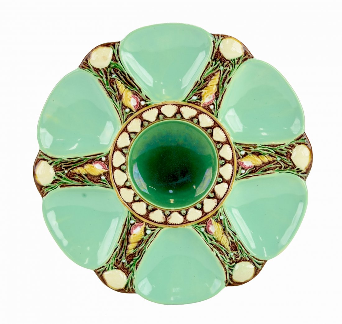 A Fine Quality Minton Majolica 6 well celadon oyster: A Fine Quality Minton Majolica 6 well celadon oyster plate c.1875 Modeled as a circular plate with celadon wells separated by shells and seaweed, the sea green circular central well surrounded by conc