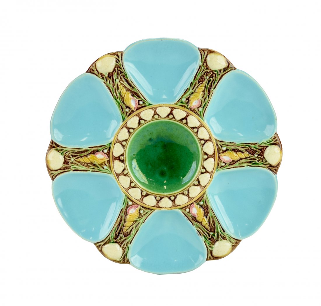 A Fine Quality Minton Majolica 6 well Turquoise oyster: A Fine Quality Minton Majolica 6 well Turquoise oyster plate c.1875 Modeled as a circular plate with turquoise wells separated by shells and seaweed, the sea green circular central well surrounded by