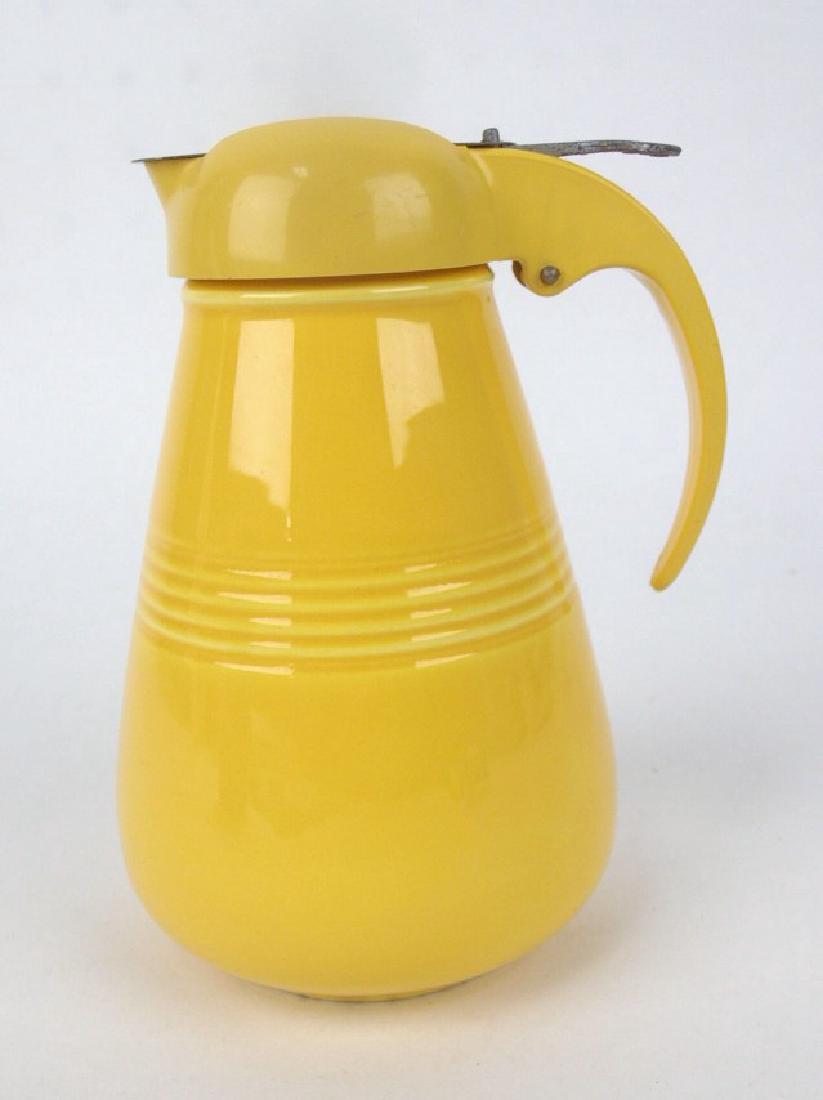 Fiesta Harlequin syrup pitcher, yellow (1 of 1)