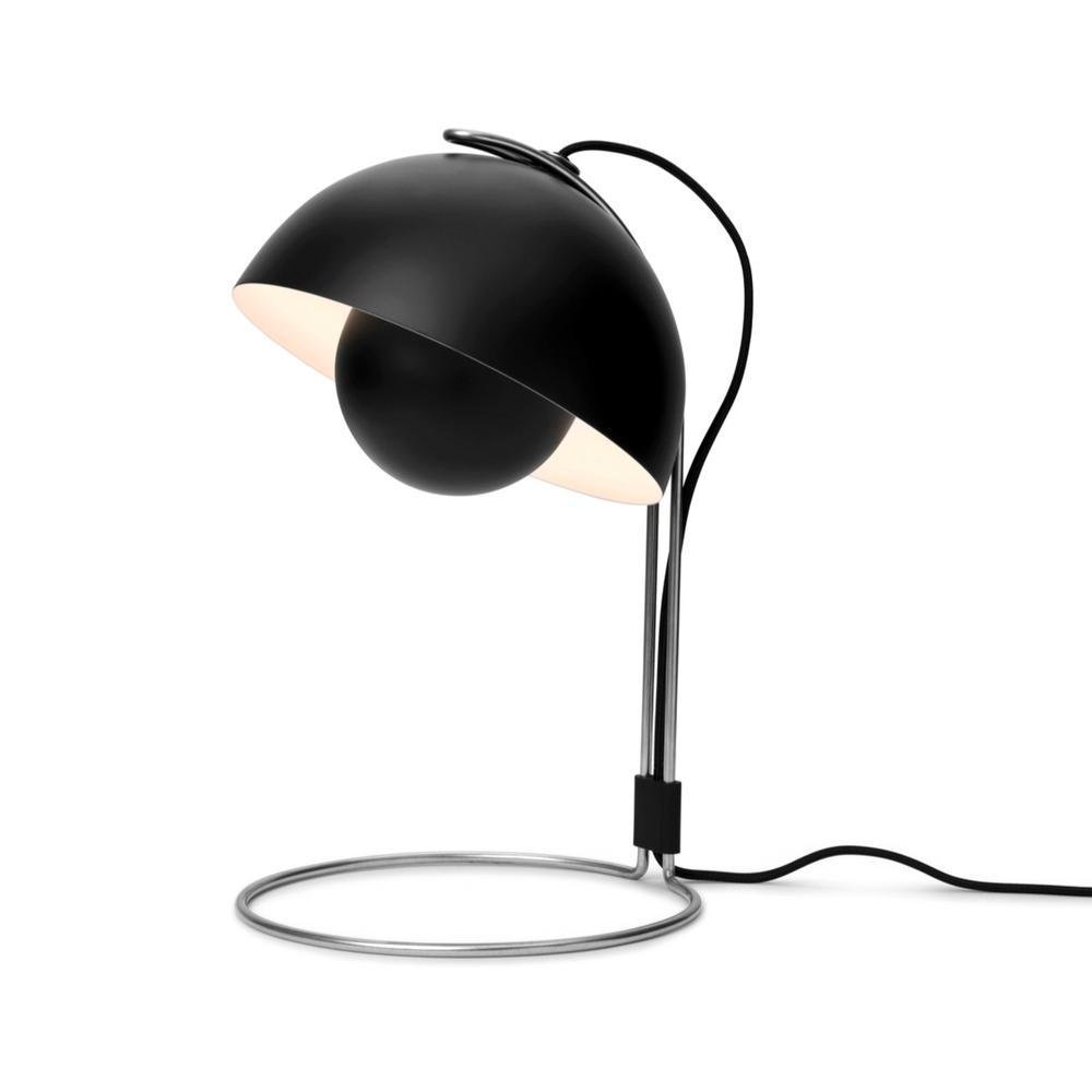 Verner Panton | Flowerpot 4 | 1960s: FlowerPot VP4 Table Lamp Design classic from 1969, created by Verner Panton. Black shade and semi-sphere partially covering the light source. Adjustible angle for lamp head on runner.Circular, metal b