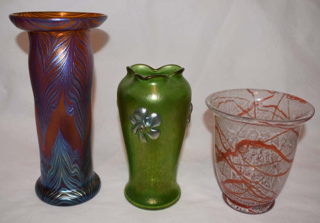 3 Early Loetz Vases | Phenomenon | Ausf. 56 | Schaum: Loetz Vase Phanomenon Vase. Genre: 829 Date:Early 20th Century Cylindrical vase with wide lip. Attr: Hofstötter. Orange/brown Ciselé ground with irredescent blue pulled feathers.Ground pontil. No ch