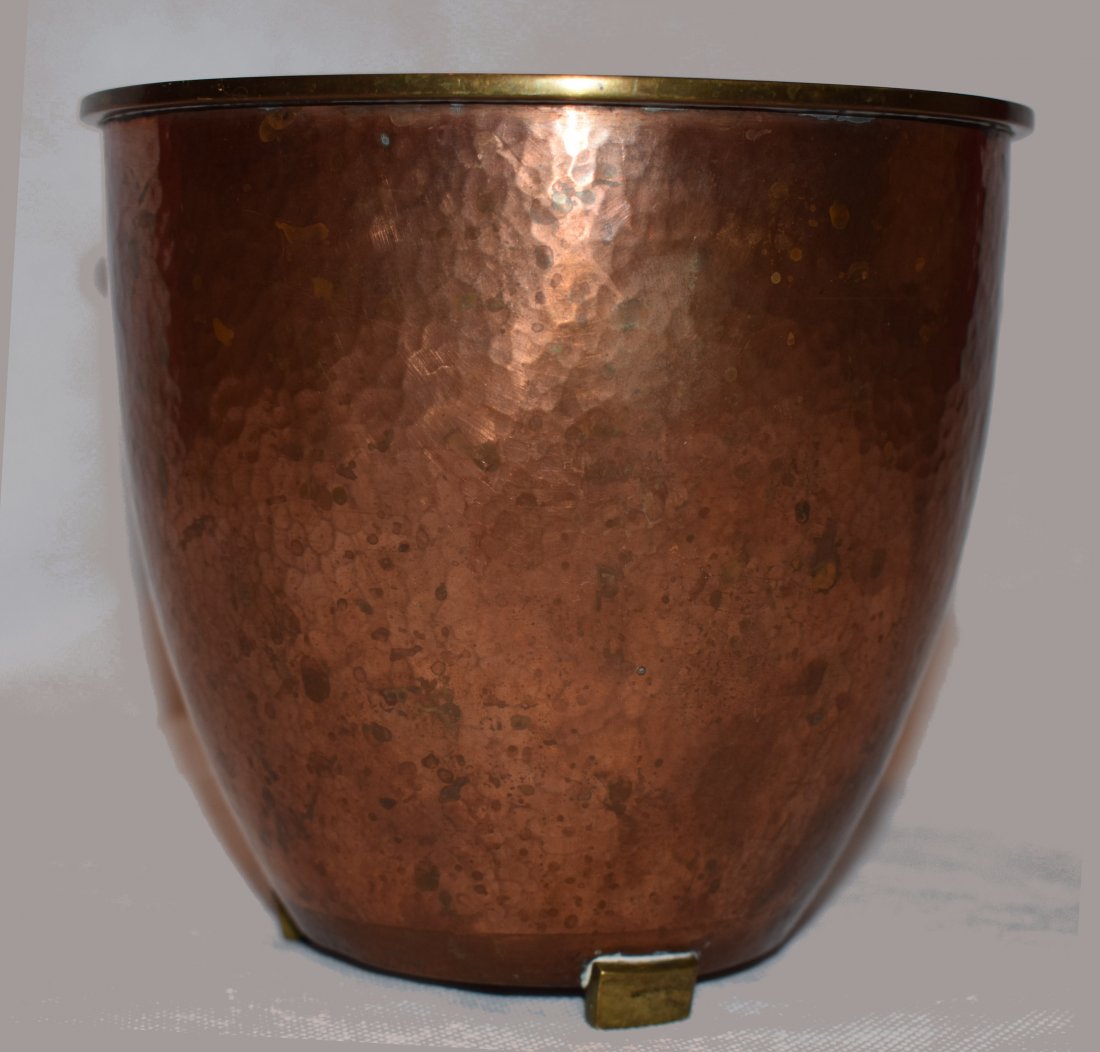 Hagenauer | Footed Copper Pot: Early Karl Hagenauer footed copper flower pot. Description Hammered copper pot with 3 brass feet.Stamped: Werkstatten Hagenauer Wien, wHw, Made in Austria, Karl Dimensions: Height: 13.8 cm Diameter (t