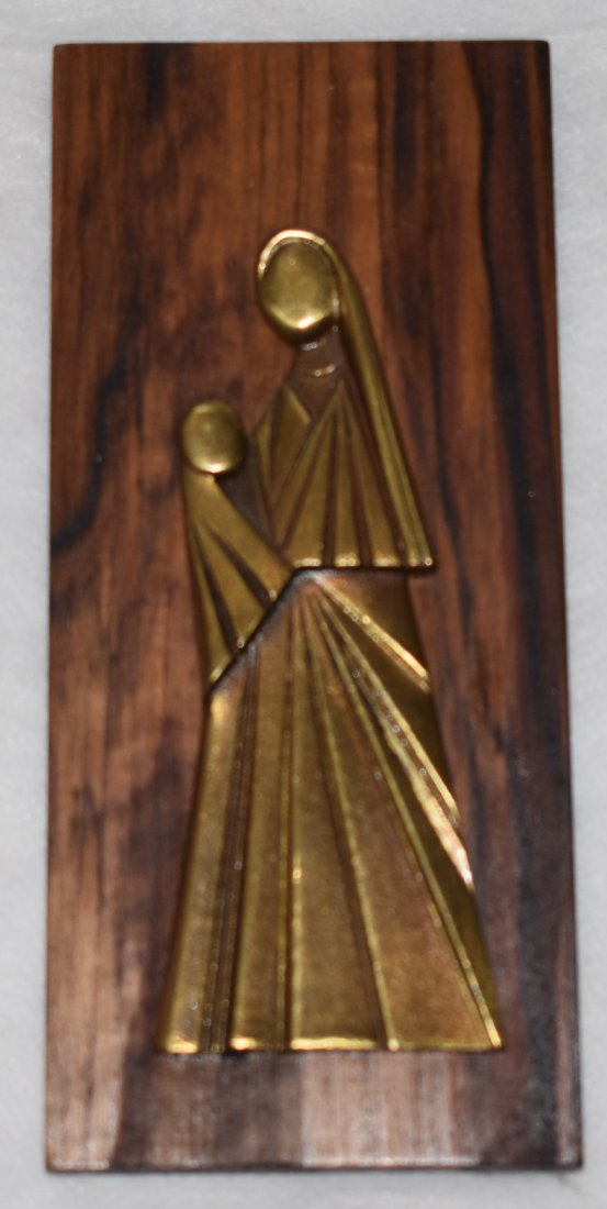 Hagenauer | Holy Family | Rare: Hagenauer, Vienna. Madonna and Child. Date: 1940-50s Execution: Franz Hagenauer, Werkstatt Hagenauer Wien (wHw) Description Beautiful brass depicting Mary and holy child on wooden mount.Stamped: Hagen
