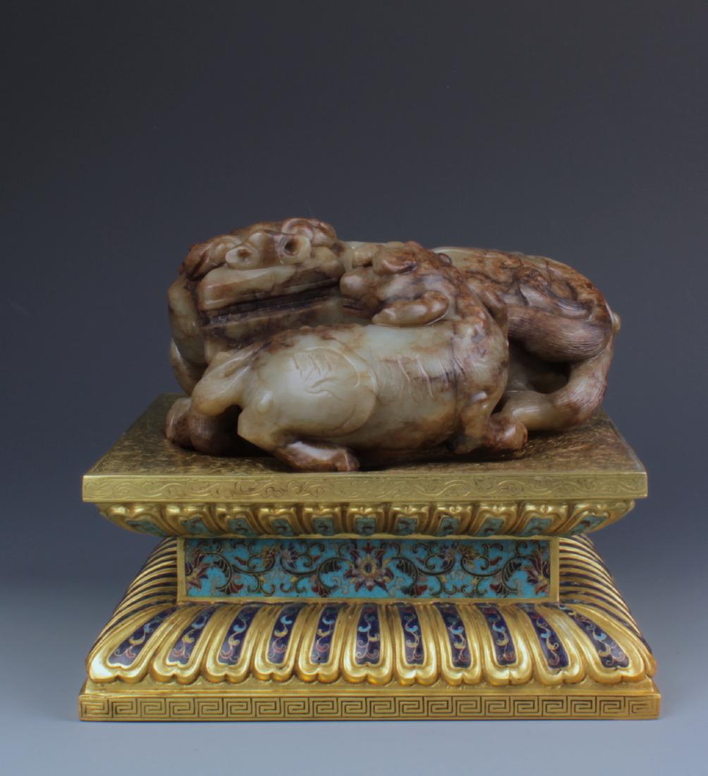 A Celadon Jade Figure of Lions With Gilt Bronze Stand (1 of 8)