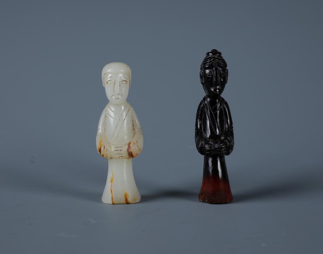 A Pair of Fine Carved White and Black Jade Figurines (1 of 2)