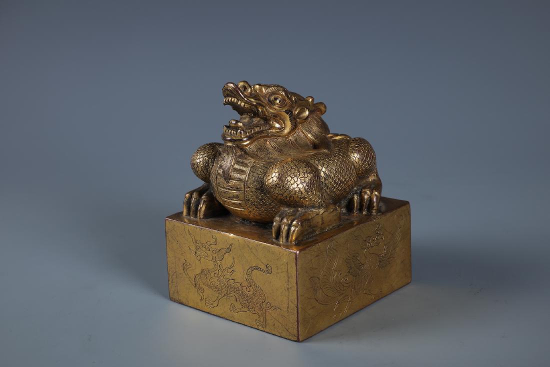 A LARGE GILT BRONZE MYTHICAL BEAST SEAL (1 of 7)