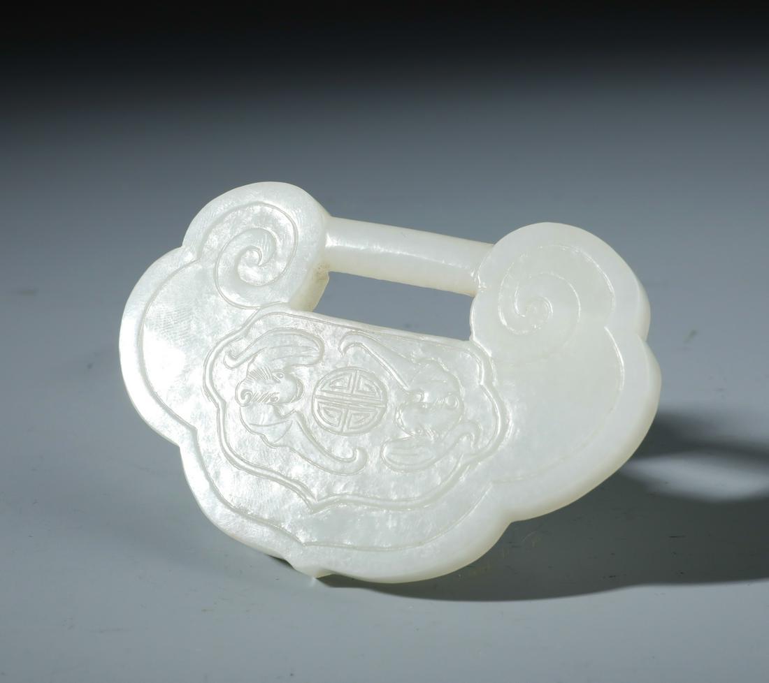 A Finley Carved Chinese White Jade Ruyi Shaped Pendent (1 of 2)