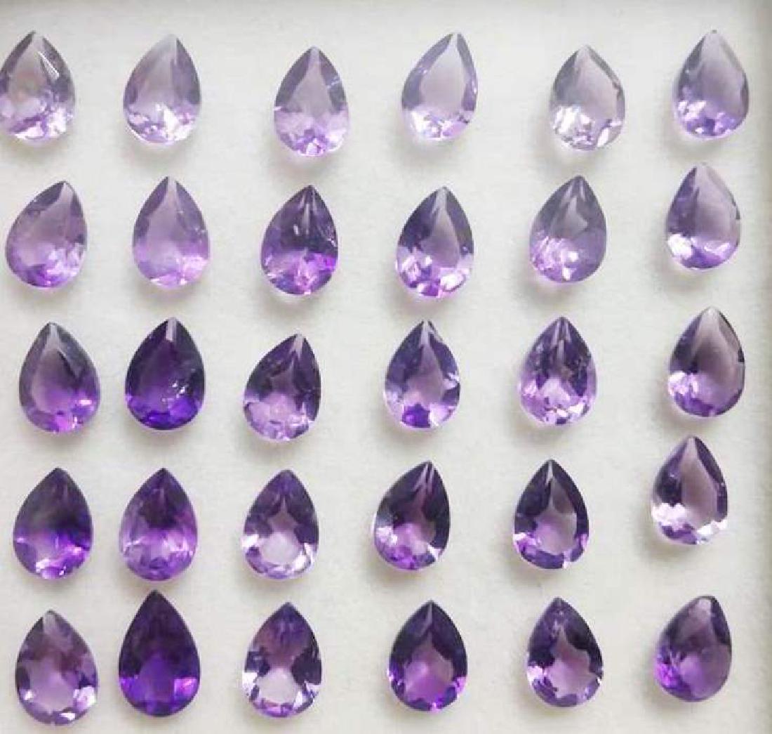 18.95 ct Natural Purple Pear Cut Amethyst Lot: Natural Purple Pear Cut Amethyst Lot~~MM Size 7 x 5 x 3~~