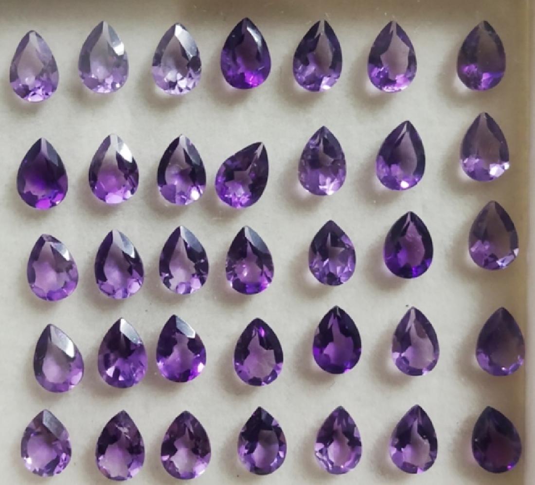 21.25 ct Pear Cut Natural Amethyst Lot: MM SIZE = 7 x 5 x 3