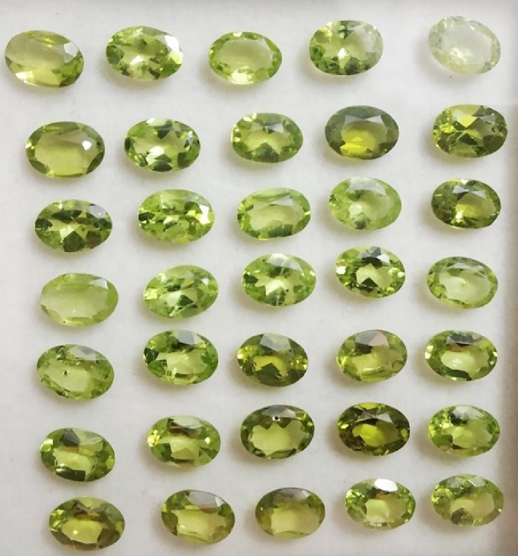 25.15 ct Oval Cut Natural Green Peridot Wholesale Lot: Oval Cut Natural Green Peridot Wholesale Lot~~MM Size