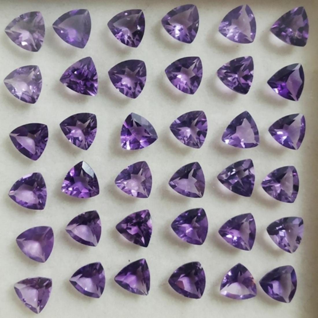 22.54 ct Trillion Cut Natural Amethyst Lot: MM SIZE = 6 x 6 x 3