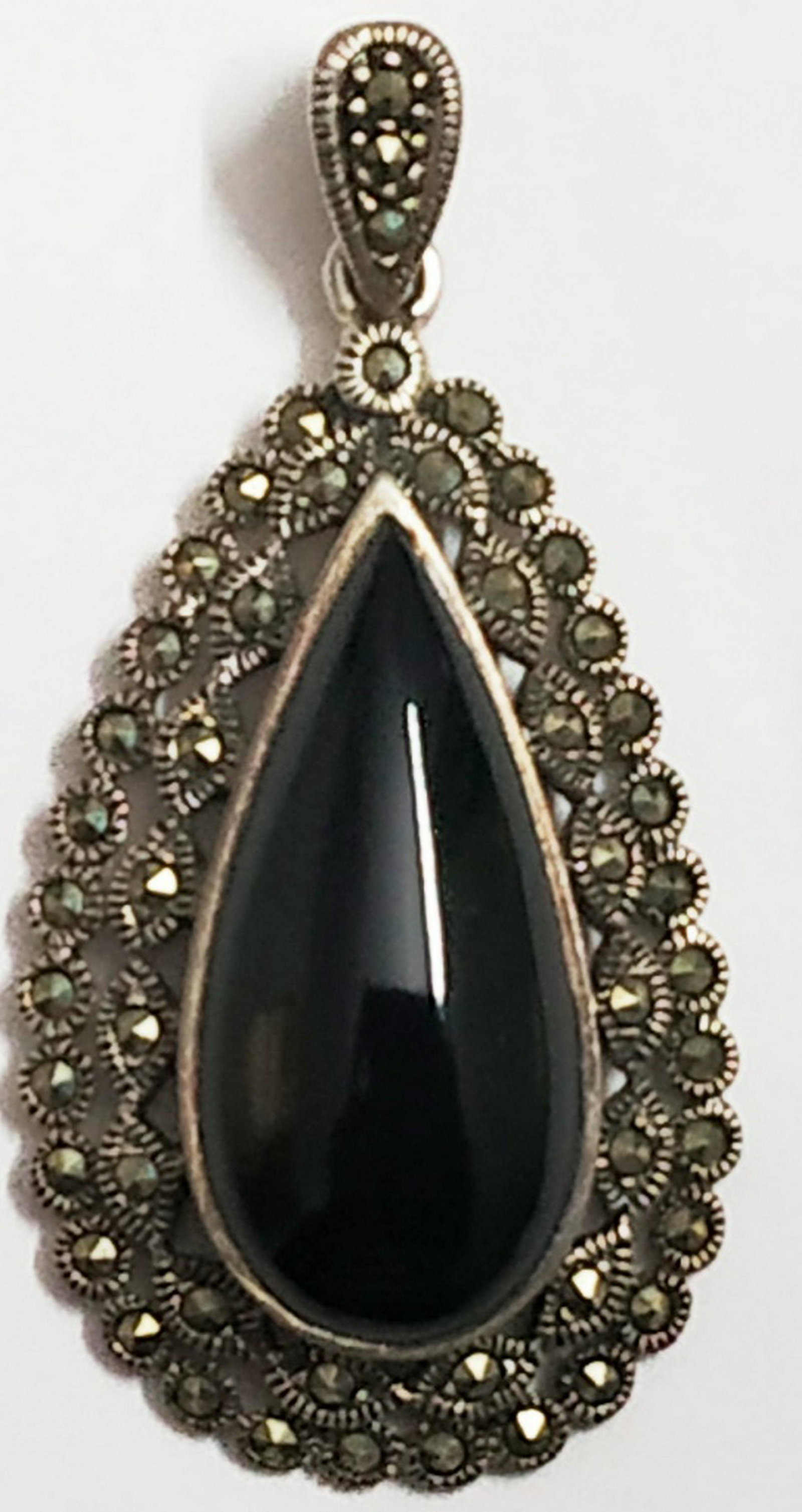 925 Sterling Silver Pendant With Marcasite Onyx: Wt. 8.600 gram MM Size : 49 x 24