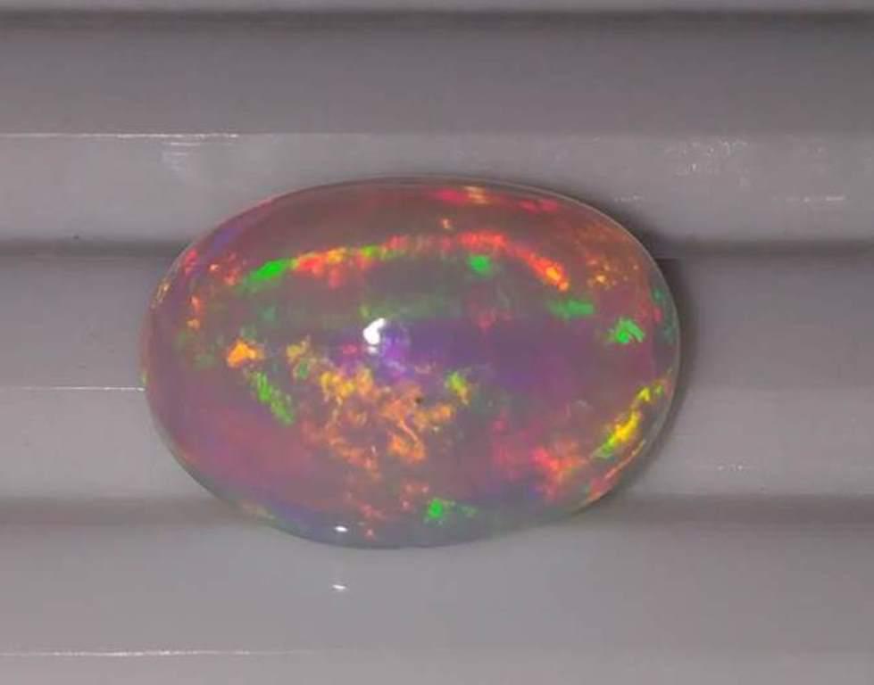 2.85 ct Natural Oval Fire Rainbow Opal Gemstone (1 of 1)