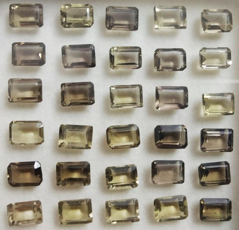 29.24 ctEmerald Cut Natural Smoky Quartz Wholesale Lot: Emerald Cut Natural Smoky Quartz Wholesale Lot~~MM Size 7 x 5 x 3~~