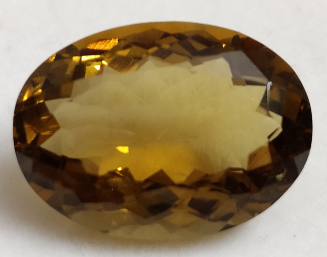 22.98 ct Oval Cut Natural Beer Quartz: MM SIZE = 23 x 16 x 10